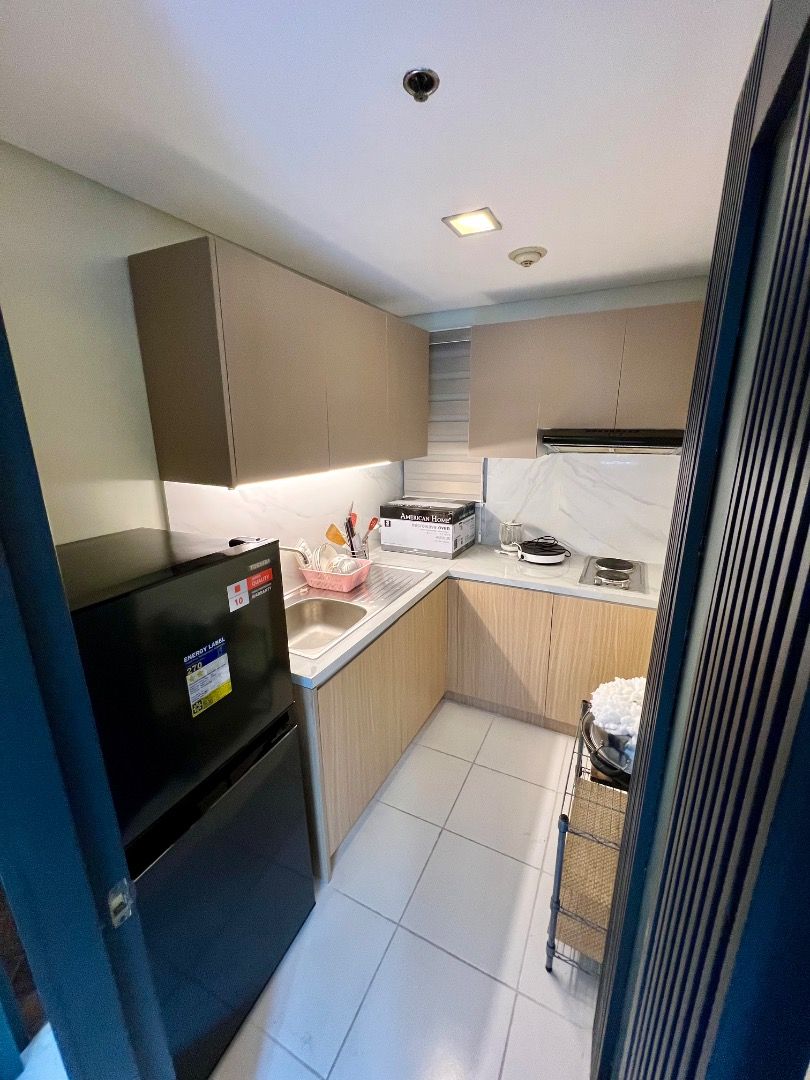 The Columns Ayala Avenue 1BR (Category: Apartments & Condos) located in Pasay City. Submitted by _russ_ (Listing ID 1112199114, Image 3). Description: 1br fully furnished and interior decorated unit approximately 52 sq.m. with balcony customized living room sofa bed 4 seater customized dining set 2 seater breakfast nook living room a/c 40 inch smart tv refrigerator microwave oven range hood electric stove granite finish kitchen top Vacuum cleaner