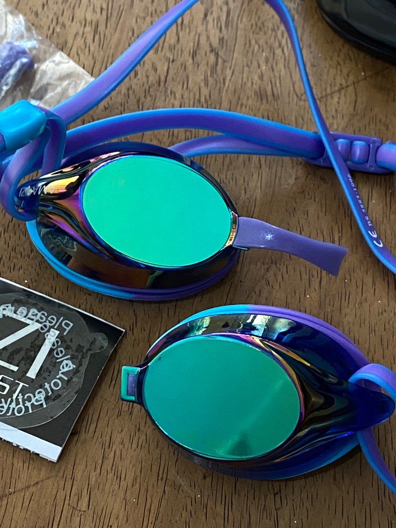 AMANZI Axion Aqua/Purple Goggles (Category: Everything Else Others) located in Las Pinas. Submitted by heyhlry (Listing ID 1386824096, Image 2). Description: - new; but protective film was removed - with nose bridges (altho they got a bit brittle - the reason it broke) - just needs a couple new nose bridges and its good as new! - w case! and AMANZI swim cap freebie if youre getting it :) rfs: i already have the pink axion one and the nose bridges