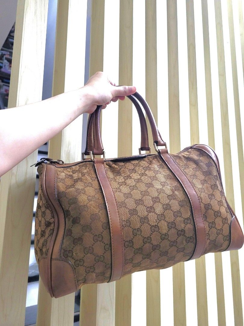 Vintage Gucci Boston Speedy Duffle (Category: Luxury Bags & Wallets) located in Antipolo. Submitted by dlolin (Listing ID 1386910165, Image 1). Description: Timeless and beautiful 35cm If you are very maselan this is not for you. Vintage pieces are for the Vintage lovers Visible Rubs on the Canvas Neat interior.