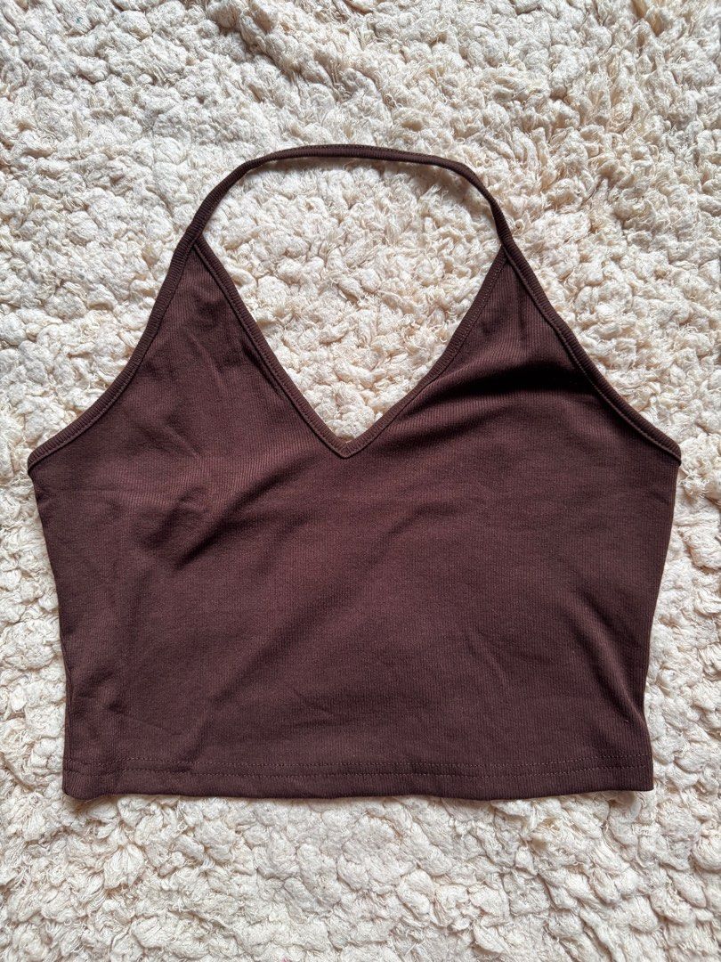 Brown Halter Top (Category: Sleeveless) located in Singapore. Submitted by shimmerfinds (Listing ID 1386934708, Image 1). Description: Stretchable Can fit to Large.