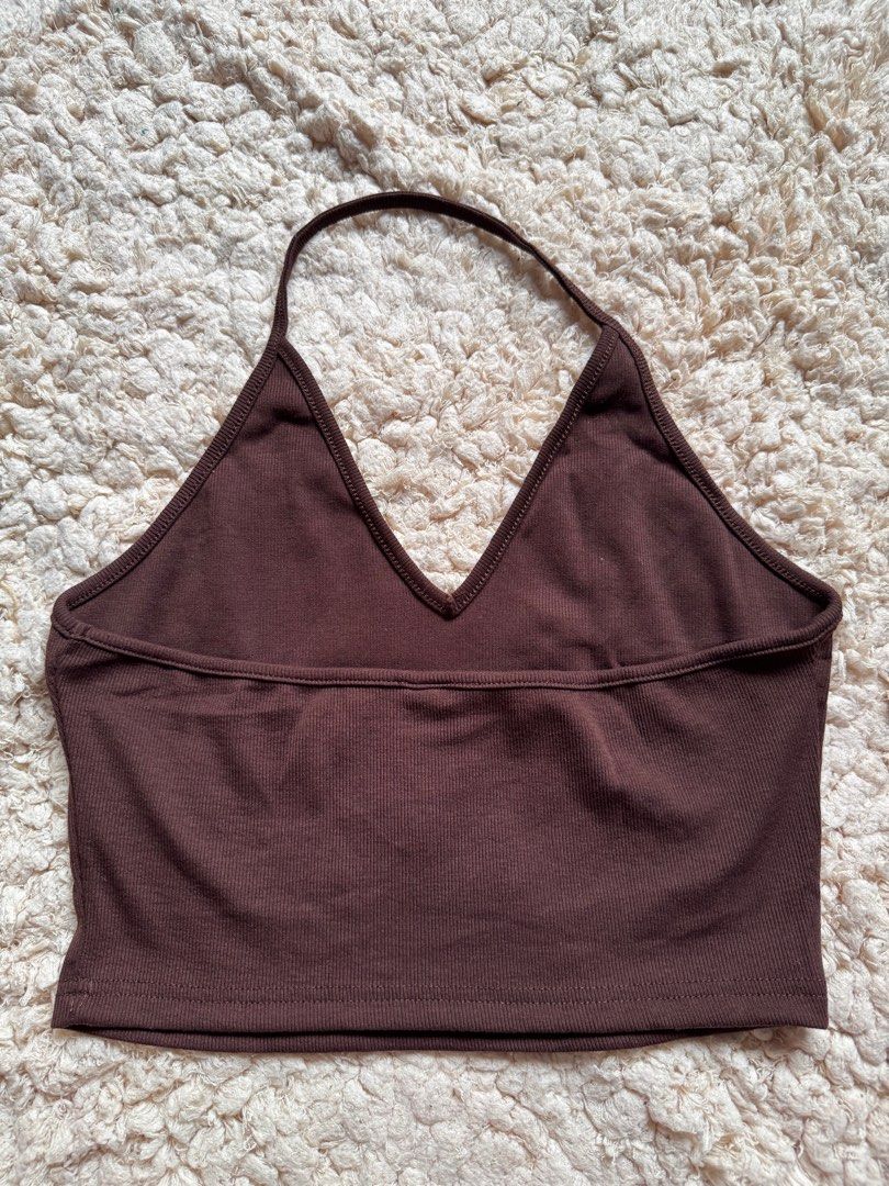 Brown Halter Top (Category: Sleeveless) located in Singapore. Submitted by shimmerfinds (Listing ID 1386934708, Image 2). Description: Stretchable Can fit to Large.
