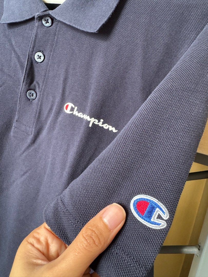 Champion Polo Shirt (Category: Tshirts & Polo Shirts ) located in Mandaluyong City. Submitted by ellasellstuff (Listing ID 1386821159, Image 2). Description: Authentic Champion Polo Shirt Worn once Navy Blue color Size Medium MOP: BPI/UB/Gcash.
