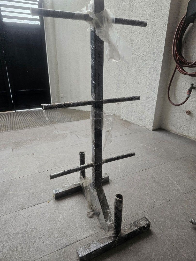 Handlebars and rack for sale (Category: Weights & Dumbbells) located in Las Pinas. Submitted by mr.janoski (Listing ID 1386875136, Image 2). Description: for sale as pack only. 5ft handle bar and 1 pair dumbbell handle and rack.new condition.nakaplastic pa yung rack as seen in photo.