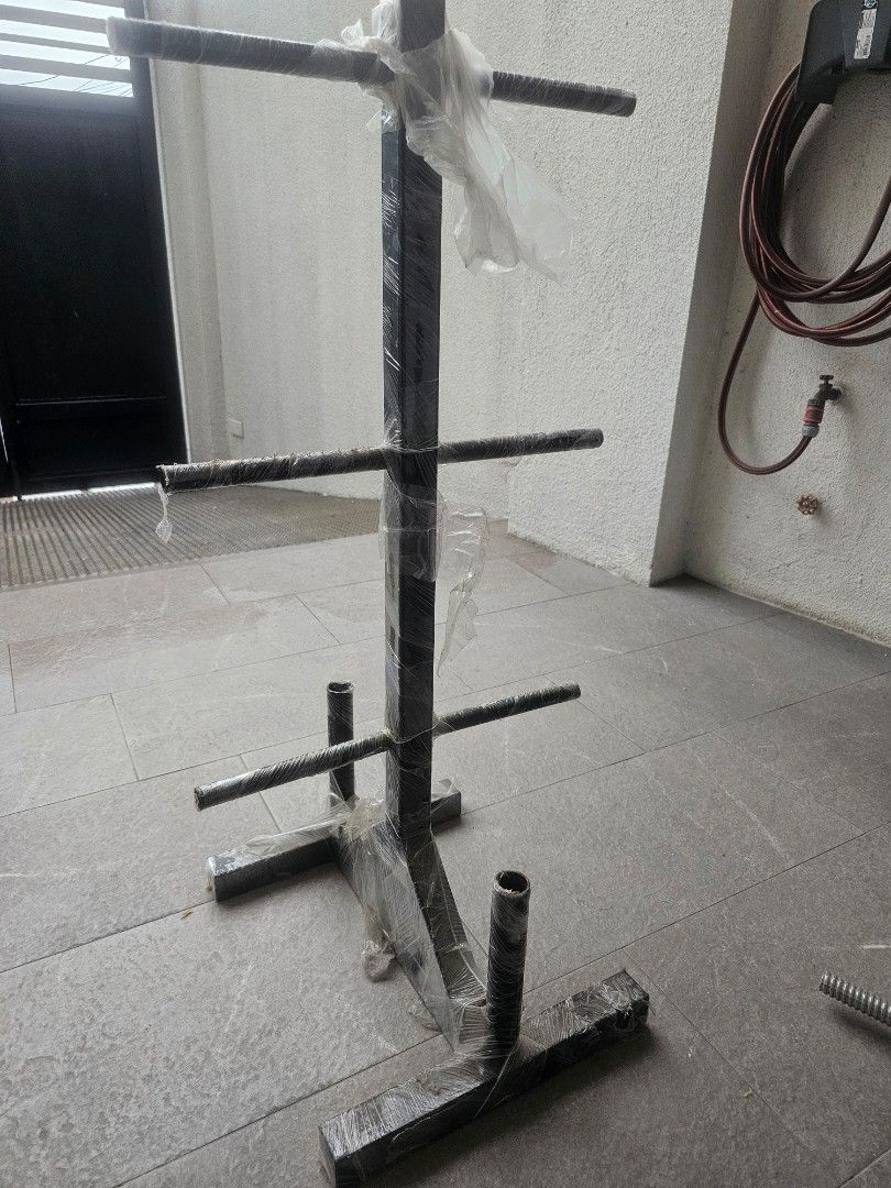 Handlebars and rack for sale (Category: Weights & Dumbbells) located in Las Pinas. Submitted by mr.janoski (Listing ID 1386875136, Image 3). Description: for sale as pack only. 5ft handle bar and 1 pair dumbbell handle and rack.new condition.nakaplastic pa yung rack as seen in photo.