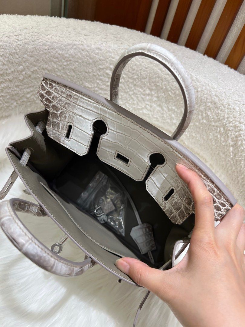 Hermes Birkin 25 Himalayan (Category: Luxury Bags & Wallets) located in Pasig City. Submitted by wmsbags_2 (Listing ID 1386922367, Image 2). Description: Available ❗️ VIP HANDMADE ✅Perfect workmanship ✅Fully hand stitched ✅Fine stamp & Code ✅100% Hardware materials structured ✅Real Leather ✅We do deliver (any) ✅ or meet up ( metro manila area) ✅We shipp all nationwide ✅Complete Inclusion MODE OF PAYMENT 📌CREDIT CARD & Cash accepted 📌Gcash or Ba