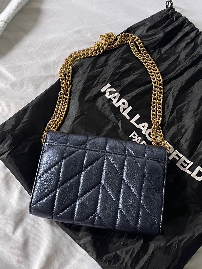Karl Largerfeld WOC (Category: Cross-body Bags) located in Batangas. Submitted by hellocedi (Listing ID 1386841776, Image 3). Description: Didn’t buy this on sale. Selling my KL woc. What you see is what you get. Request more photos if needed. You can wear it as a cross-body, shoulder bag or a hand bag. RFS: decluttering.