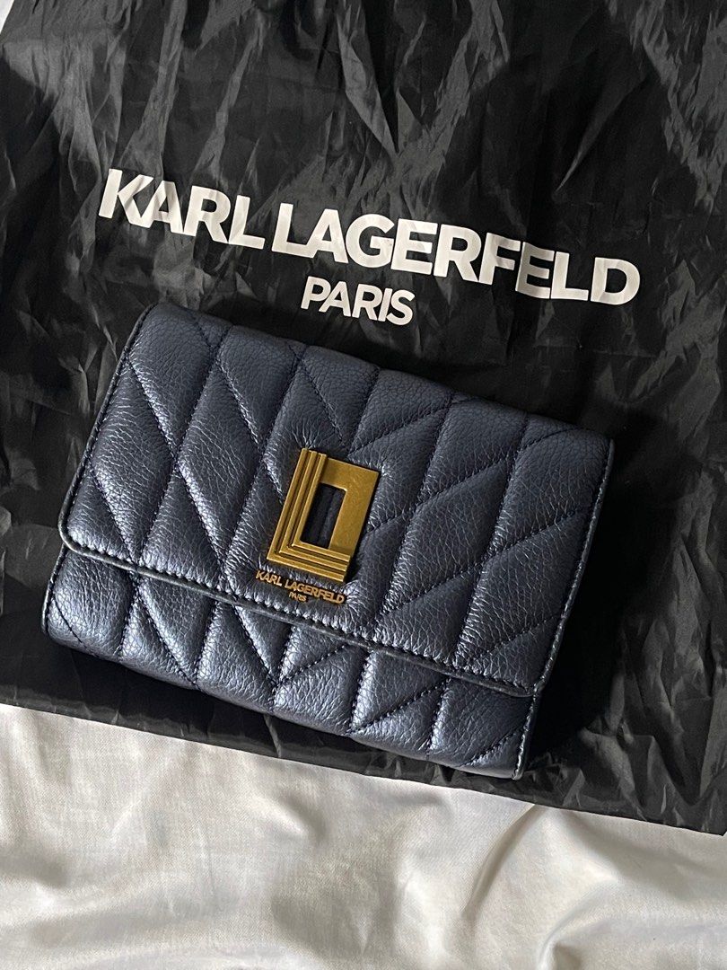 Karl Largerfeld WOC (Category: Cross-body Bags) located in Batangas. Submitted by hellocedi (Listing ID 1386841776, Image 2). Description: Didn’t buy this on sale. Selling my KL woc. What you see is what you get. Request more photos if needed. You can wear it as a cross-body, shoulder bag or a hand bag. RFS: decluttering.
