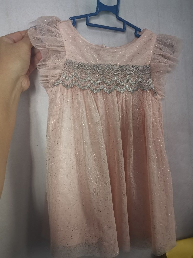 Next Tulle Occasion Dress (Category: Babies & Kids Fashion) located in Antipolo. Submitted by 3js_collection (Listing ID 1386854731, Image 1). Description: Very good condition no defect Worn less than 5x. Very nice fabric, with soft cotton lining, very comfortable sa skin ni baby Color blush pink Tagged 6-9 mis.