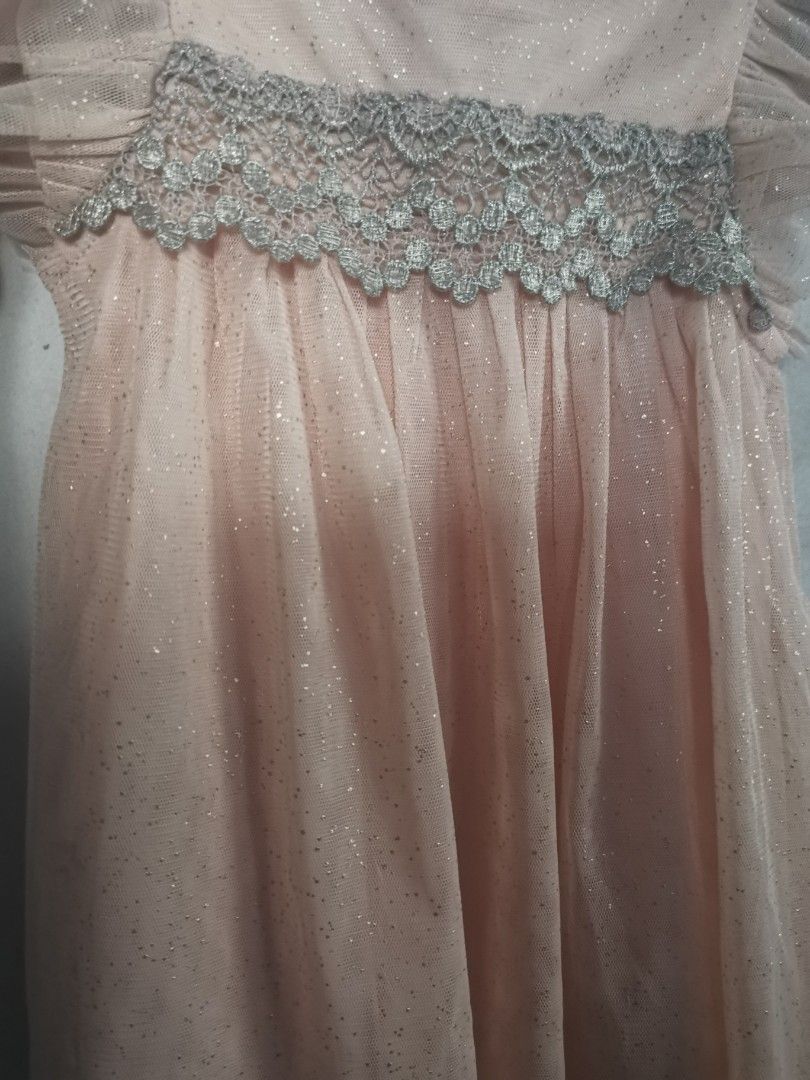 Next Tulle Occasion Dress (Category: Babies & Kids Fashion) located in Antipolo. Submitted by 3js_collection (Listing ID 1386854731, Image 3). Description: Very good condition no defect Worn less than 5x. Very nice fabric, with soft cotton lining, very comfortable sa skin ni baby Color blush pink Tagged 6-9 mis.