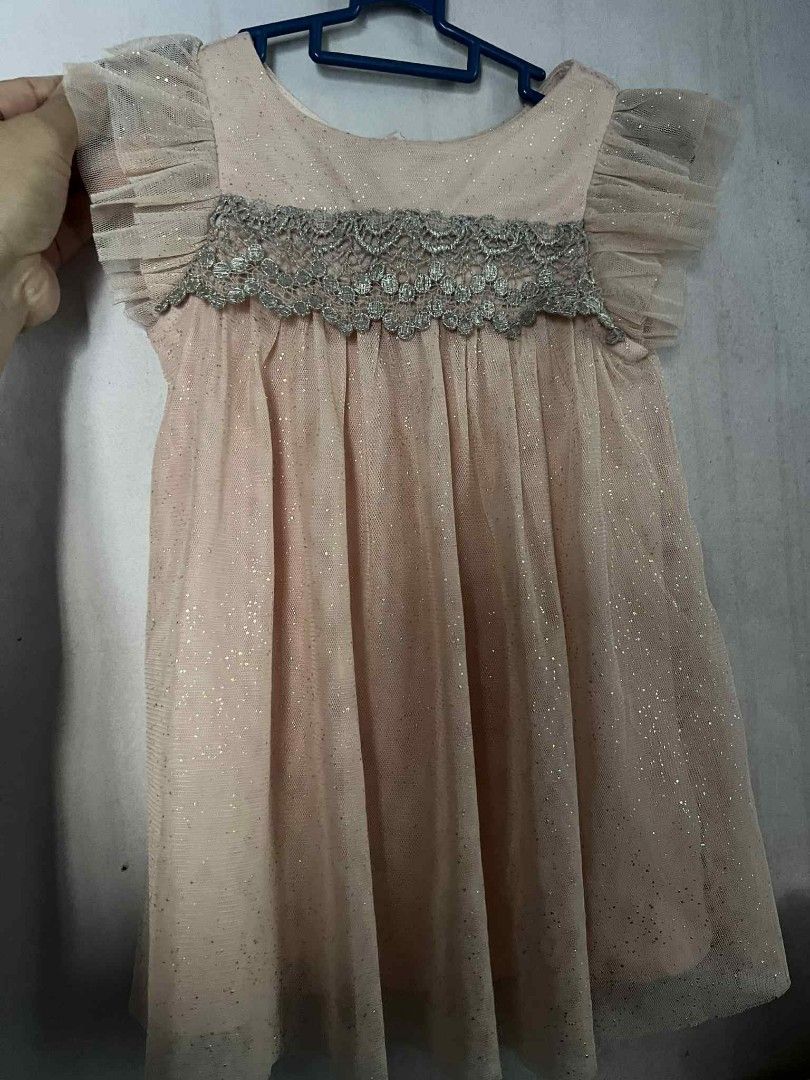 Next Tulle Occasion Dress (Category: Babies & Kids Fashion) located in Antipolo. Submitted by 3js_collection (Listing ID 1386854731, Image 2). Description: Very good condition no defect Worn less than 5x. Very nice fabric, with soft cotton lining, very comfortable sa skin ni baby Color blush pink Tagged 6-9 mis.