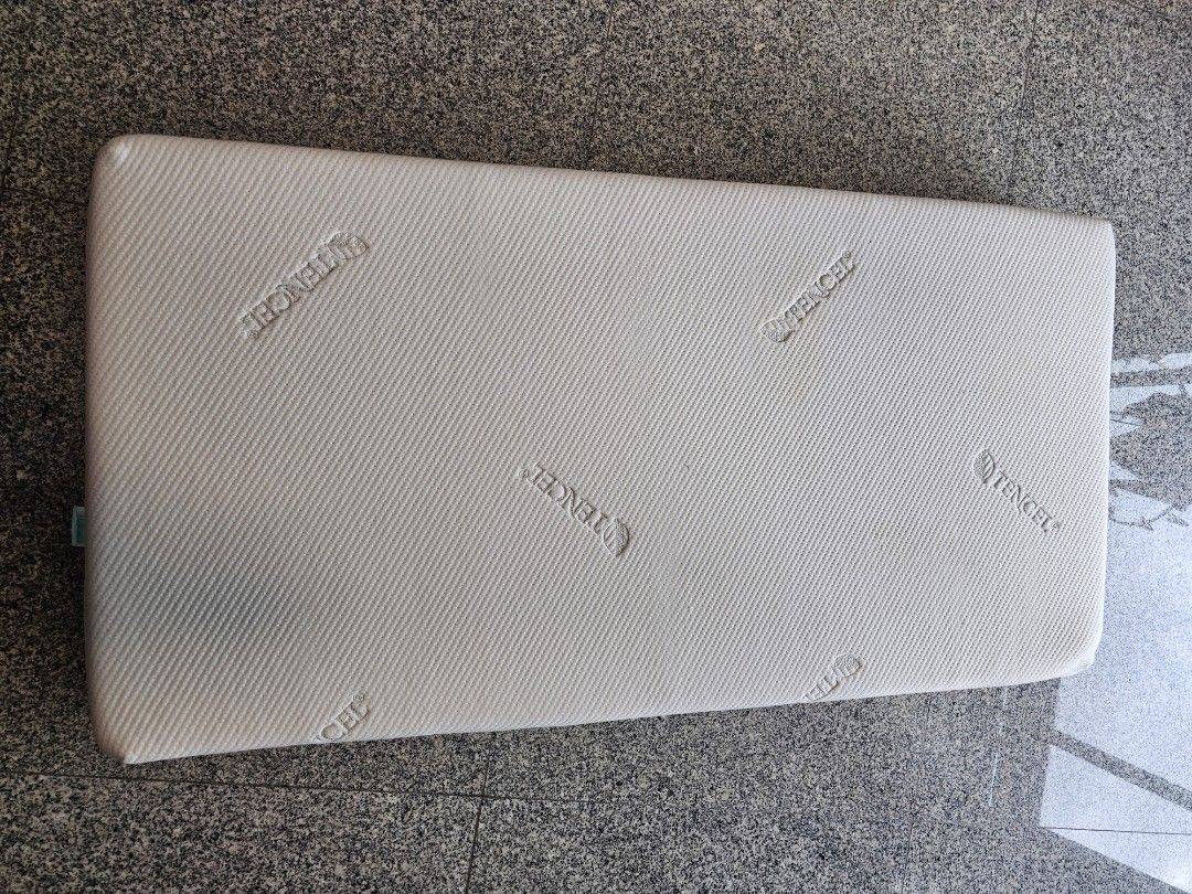 Tencel Mattress for kids (Category: Bed Frames & Mattresses) located in Singapore. Submitted by hamsumlim (Listing ID 1386880194, Image 1). Description: - Tencel material is known for its softness and breathability, providing a comfortable sleep surface. Perfect for adding an extra layer of comfort to your bed. - Size: 120cm x 62cm x 13cm thinkness - Rarely used as kid still prefer to sleep with us, and already prepared a bigger mattress when he 