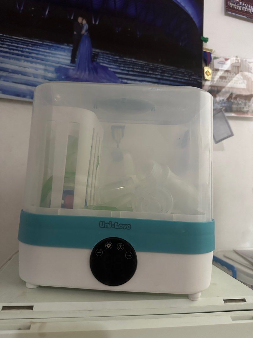 Unilove bottle sterilizer and dryer (Category: Breastfeeding & Bottle Feeding) located in Meycauayan. Submitted by meowskyy (Listing ID 1386912039, Image 3). Description: Unilove Baby bottle sterilizer and dryer Seldom used. Almost new. ✅ can be used for pacifiers and other milk accessories ✅ orig price is 2,900 ✅ sf shoulder by buyer.