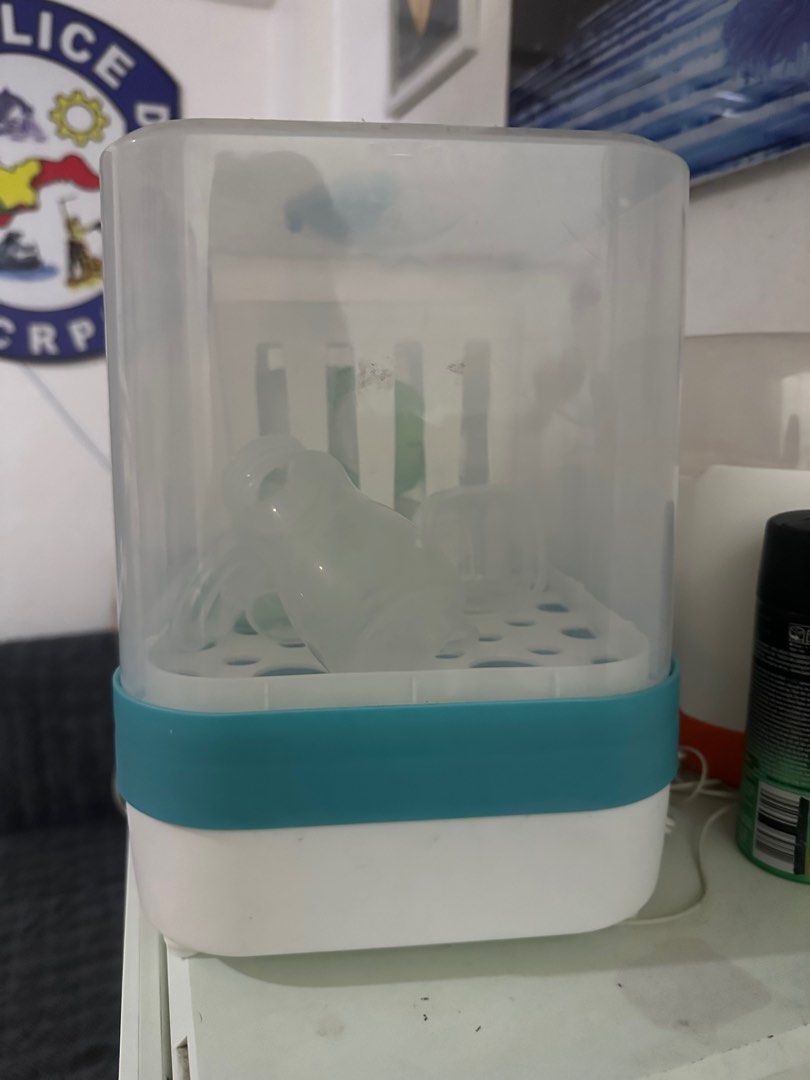 Unilove bottle sterilizer and dryer (Category: Breastfeeding & Bottle Feeding) located in Meycauayan. Submitted by meowskyy (Listing ID 1386912039, Image 2). Description: Unilove Baby bottle sterilizer and dryer Seldom used. Almost new. ✅ can be used for pacifiers and other milk accessories ✅ orig price is 2,900 ✅ sf shoulder by buyer.