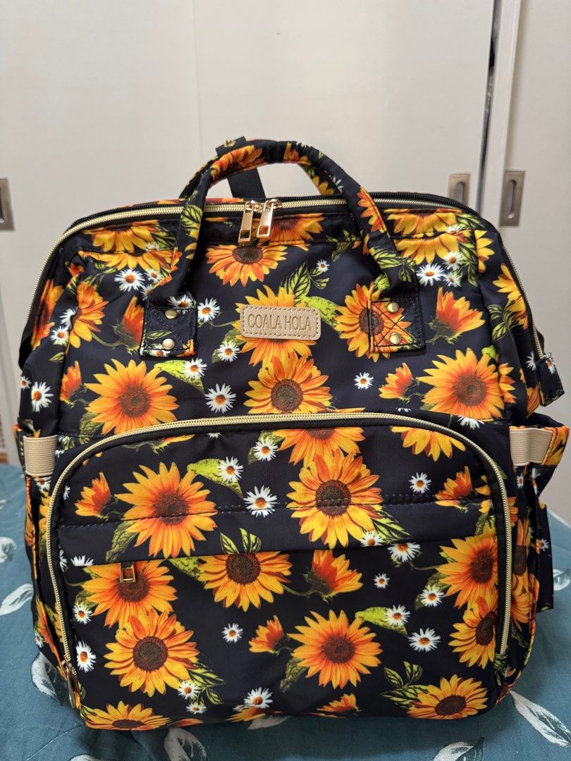 Baby Bag Backpack (Category: Backpacks) located in San Mateo. Submitted by summerph (Listing ID 1386984069, Image 1). Description: COALA HOLA 4 in 1 Baby Diaper Bag Backpack, Ergonomic Baby Diaper Bags for Boys Girls, Multi-function Waterproof Fold-able Travel Bag for Mom Dad, Sunflower, L Bought in US Brand New .