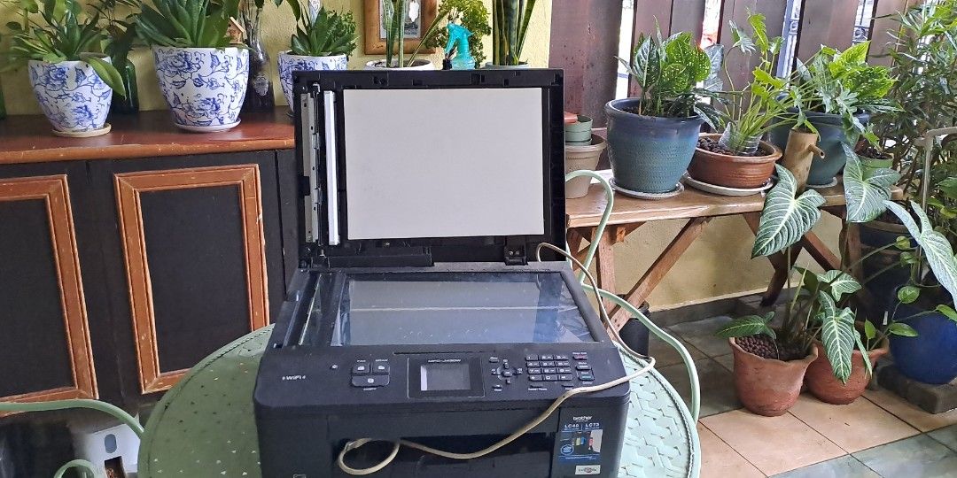 Brother printer and scanner (Broken) (Category: Printers, Scanners & Copiers) located in Kuala Lumpur. Submitted by szbmms (Listing ID 1386969708, Image 2). Description: This printer was broken and sitting in storage for maybe 10 years. Ink is leaking as well No power cord.