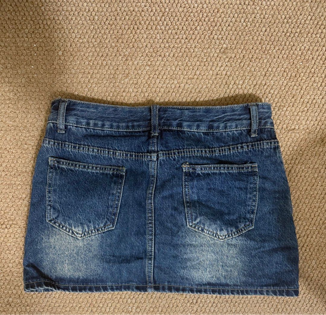 Classic Denim Mini Skirt (Category: Skirts) located in Mandaluyong City. Submitted by pyba_ (Listing ID 1387026331, Image 2). Description: Unbranded denim mini skirt with shorts inside Can fit sizes 26-27 Still in very good condition! .