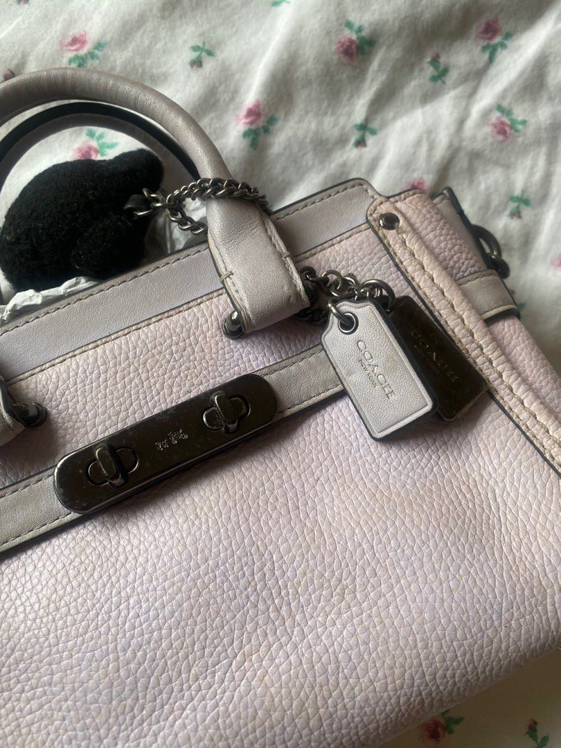 Coach x Ariana Grande Kiti Swagger (Category: Purses & Pouches) located in Paranaque City. Submitted by fancyshit (Listing ID 1386972183, Image 2). Description: RARE Coach x Ariana Grande Kiti Swagger - limited edition - only a limited number of these bags were created - Needs deep cleaning because of stains from storage - Signs of usage - bought direct from coach website - complete with charms and pompom MOP: BDO/Security Bank MOD: GGX/Lalamove.