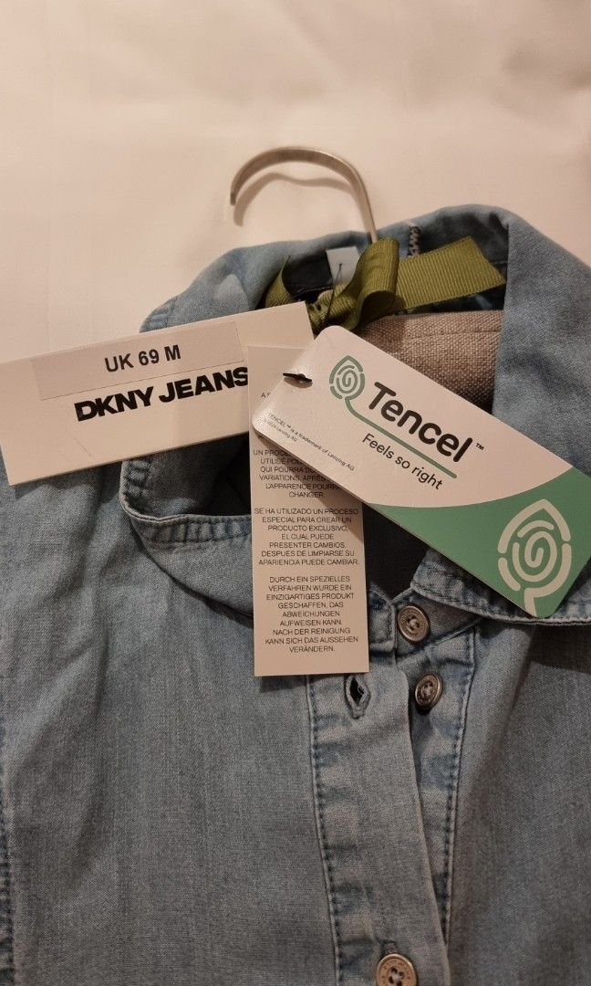 DKNY Dropped waist Tencel Light Blue Denim Dress with Belt (Category: Dresses) located in Singapore. Submitted by tianlinq (Listing ID 1386908932, Image 2). Description: BNIB DKNY Dropped waist Tencal Dress -Tencal Material -blue denim midi dress - Button-down front - Matching belt included - Perfect for casual wear PTP .