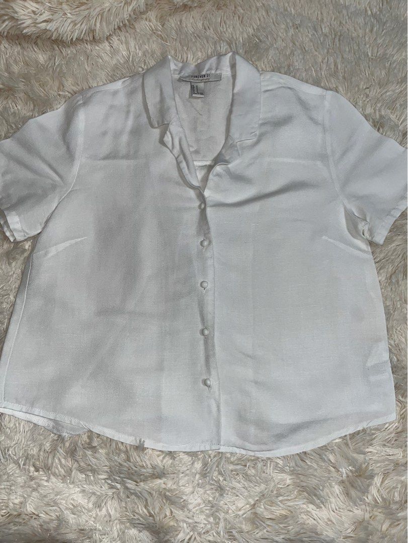 Forever 21 White Top (Category: Blouses) located in Taguig. Submitted by mafrd (Listing ID 1387039191, Image 1). Description: .