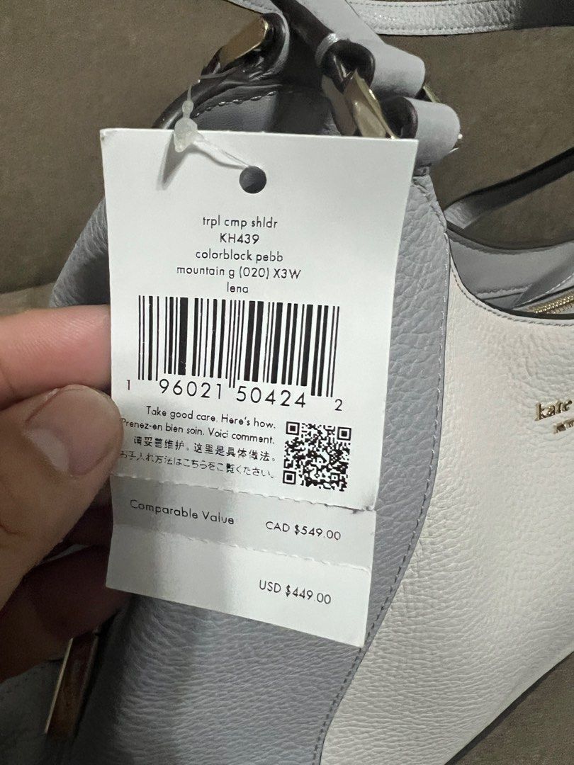 Kate Spade Lena Triple Compartment - Gray (Category: Luxury Bags & Wallets) located in San Pedro. Submitted by misslumi (Listing ID 1386969695, Image 2). Description: Brand New from US! Measurements Length: 13.2" Height: 11.12" Width: 5.2" Materials Pebbled Leather Two way script logo lining Handle Handle drop: 12" Strap Strap drop: 22" Features Middle zip compartment Back zip pocket Snap closure Metal pinmount with spade logo Dust Bag Included: 