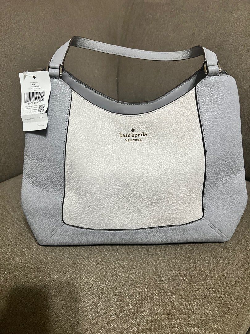 Kate Spade Lena Triple Compartment - Gray (Category: Luxury Bags & Wallets) located in San Pedro. Submitted by misslumi (Listing ID 1386969695, Image 1). Description: Brand New from US! Measurements Length: 13.2" Height: 11.12" Width: 5.2" Materials Pebbled Leather Two way script logo lining Handle Handle drop: 12" Strap Strap drop: 22" Features Middle zip compartment Back zip pocket Snap closure Metal pinmount with spade logo Dust Bag Included: 