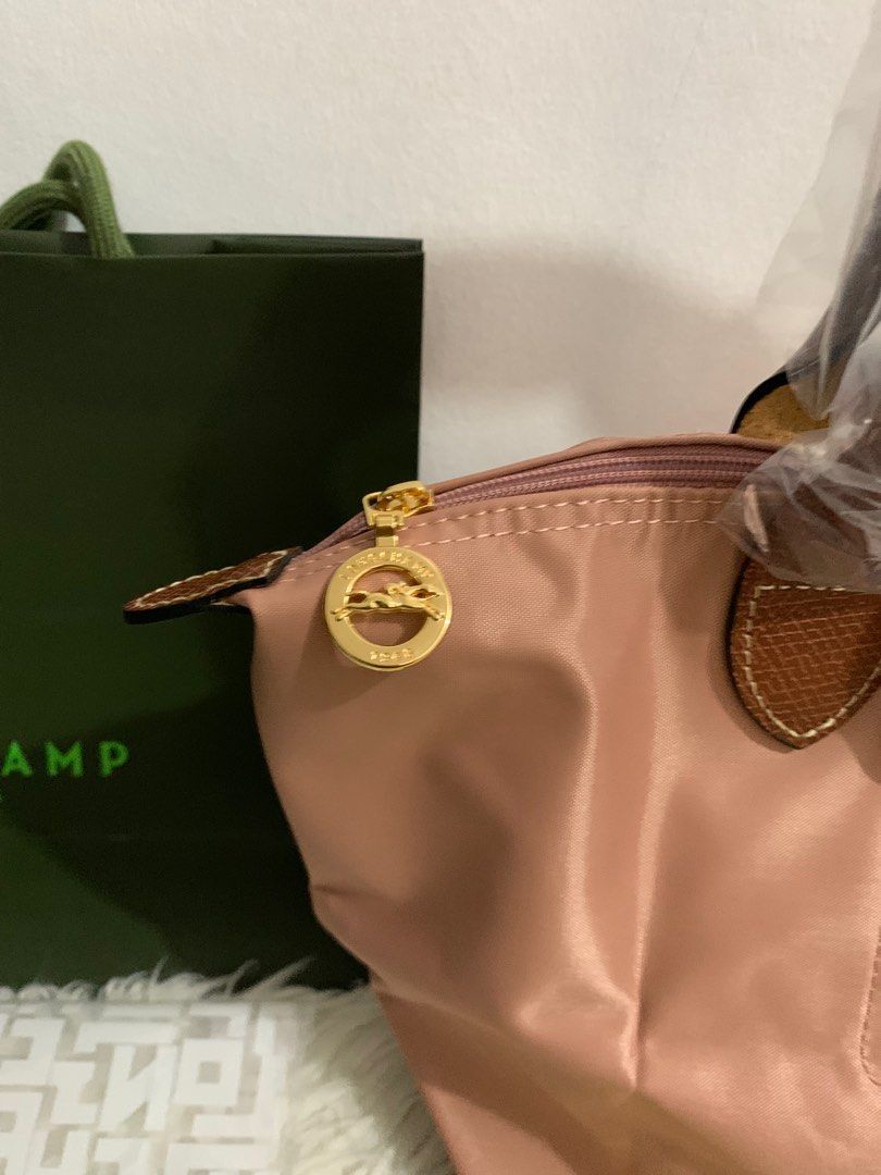 Longchamp Medium Classic (Category: Luxury Bags & Wallets) located in Manila. Submitted by jam.deals (Listing ID 1387065375, Image 2). Description: For Sale: Longchamp Le Pliage Classic Medium Tote (Rosethe CW) ✅ 100% Authentic ✅ Brand new ✅ Excellent condition – no issues Inclusions: • Longchamp dust bag • Paper bag • Protective plastic 💼 Price: ₱5,000+ SF For faster transactions, please contact me at: 0952 442 1386 (Limit reached here, I may n