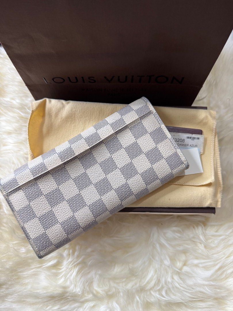 Louis Vuitton Damier Azur Wallet 💕 (Category: Luxury Bags & Wallets) located in Angeles City. Submitted by ana.delacruz (Listing ID 1386988831, Image 3). Description: 👛 Louis Vuitton Damier Azur Wallet – Authentic ✨ Classic LV elegance in white/blue checkered canvas ✨ With original box, dust bag & cards ✨ Preloved, clean inside & out, strong snap button ✨ Spacious & stylish – perfect everyday wallet 💯 Guaranteed authentic ➡️ Don’t miss this ti