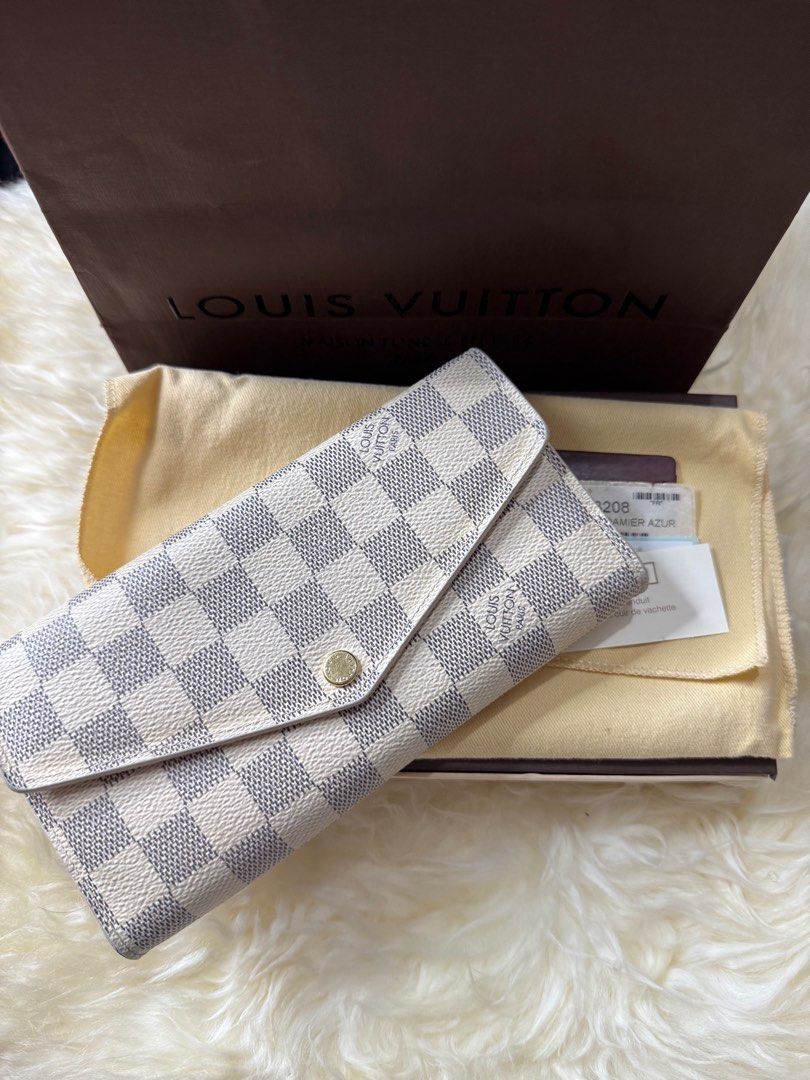 Louis Vuitton Damier Azur Wallet 💕 (Category: Luxury Bags & Wallets) located in Angeles City. Submitted by ana.delacruz (Listing ID 1386988831, Image 2). Description: 👛 Louis Vuitton Damier Azur Wallet – Authentic ✨ Classic LV elegance in white/blue checkered canvas ✨ With original box, dust bag & cards ✨ Preloved, clean inside & out, strong snap button ✨ Spacious & stylish – perfect everyday wallet 💯 Guaranteed authentic ➡️ Don’t miss this ti