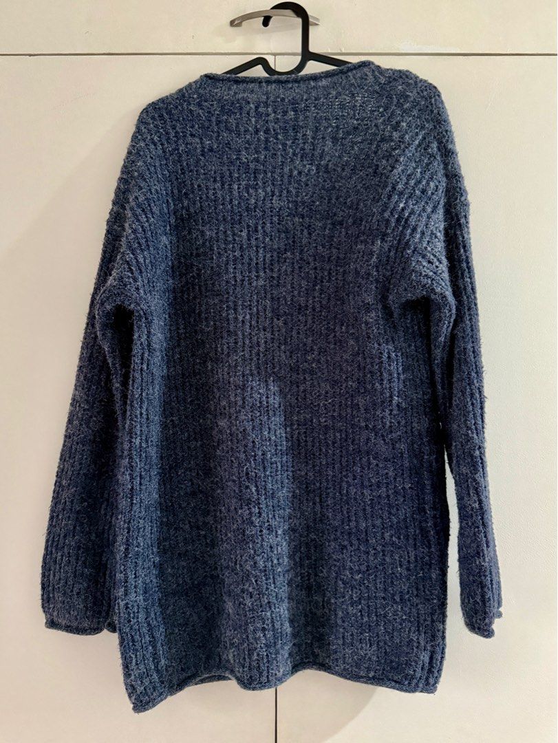 Navy Blue Long Knitted Cardigan (Category: Coats, Jackets and Outerwear) located in Cavite. Submitted by bluewaters11 (Listing ID 1387039898, Image 2). Description: SIZE: Fits S to M COLOR: Navy blue knit STYLE: Long with pockets Perfect for casual and office fits. RFS: Closet cleanup (doesn’t fit me anymore) SF: To be shouldered by the buyer MOP: GCash/BPI PAYO. No rush shipping, please. .
