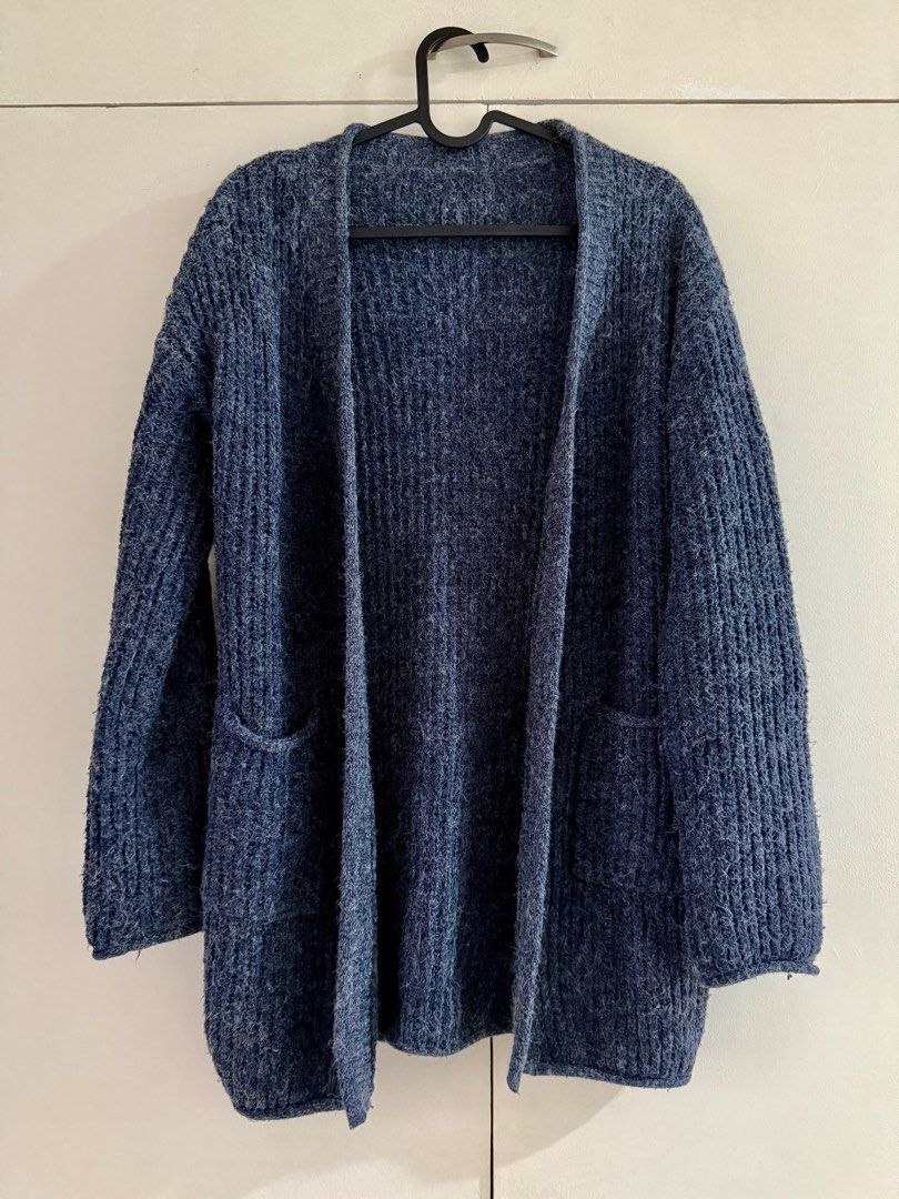 Navy Blue Long Knitted Cardigan (Category: Coats, Jackets and Outerwear) located in Cavite. Submitted by bluewaters11 (Listing ID 1387039898, Image 1). Description: SIZE: Fits S to M COLOR: Navy blue knit STYLE: Long with pockets Perfect for casual and office fits. RFS: Closet cleanup (doesn’t fit me anymore) SF: To be shouldered by the buyer MOP: GCash/BPI PAYO. No rush shipping, please. .