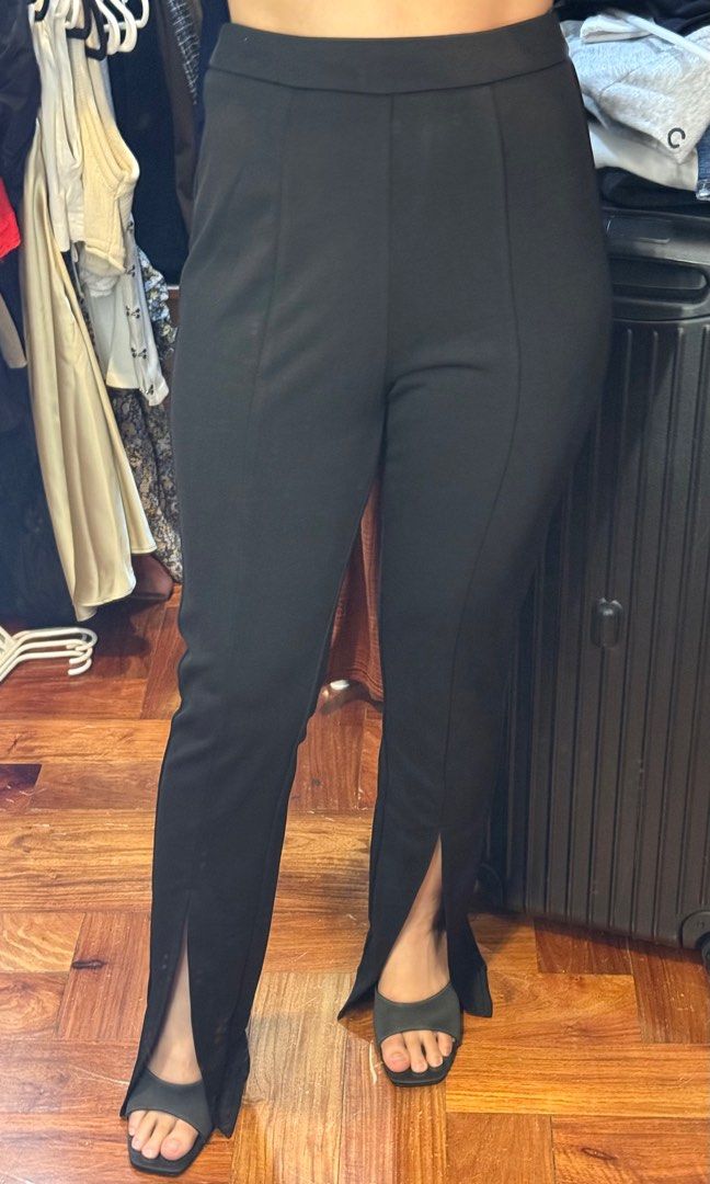 POMELO Front Slit Fitted Pants (XS) (Category: Other Bottoms) located in Quezon City. Submitted by michaelacd (Listing ID 1387121953, Image 2). Description: POMELO Front Slit Fitted Pants size: XS - brand new but already washed - i’m 5ft for reference. I was wearing heels in the photo RFS: decluttering. This cute pants need a new owner 🥹.