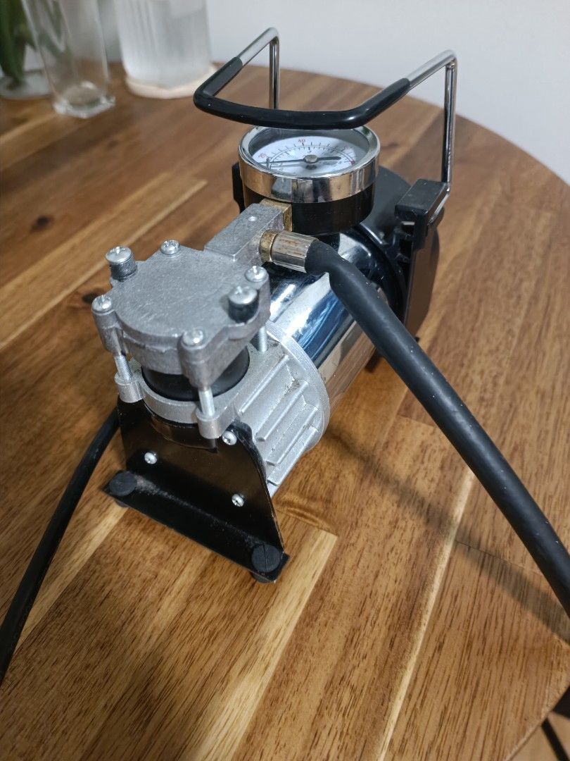 Portable Electric Air Compressor (Category: Industrial Equipment) located in Quezon City. Submitted by dada.chad (Listing ID 1387082095, Image 3). Description: Has to fix nozzle but other than that, perfectly working. Location: Near Ateneo, QC.