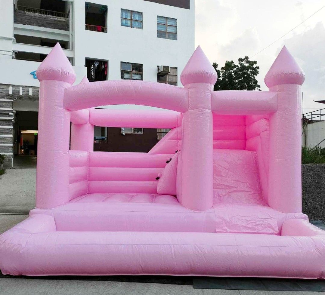 PVC pink castle inflatable playground (Category: Infant Playtime) located in Manila. Submitted by prettyme101395 (Listing ID 1387050607, Image 1). Description: used once PVC highquality material L3.5m W4m H3m.