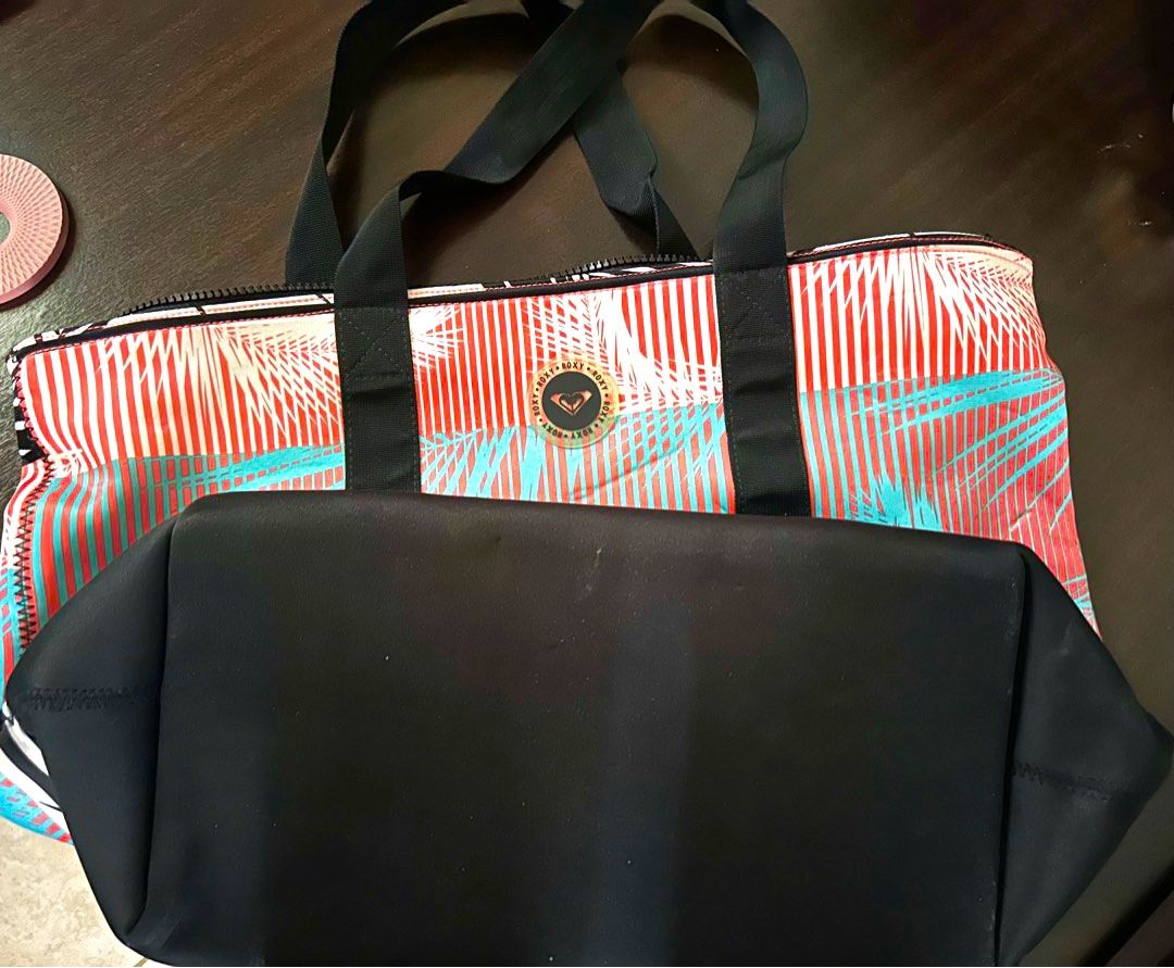 Roxy Overnight Bag (Category: Tote Bags) located in Quezon City. Submitted by spatio (Listing ID 1379263932, Image 2). Description: Roxy brand. Washable. Thick material. Can fit in up to 2-3 nights of clothes. XL size. Durable and pretty. .