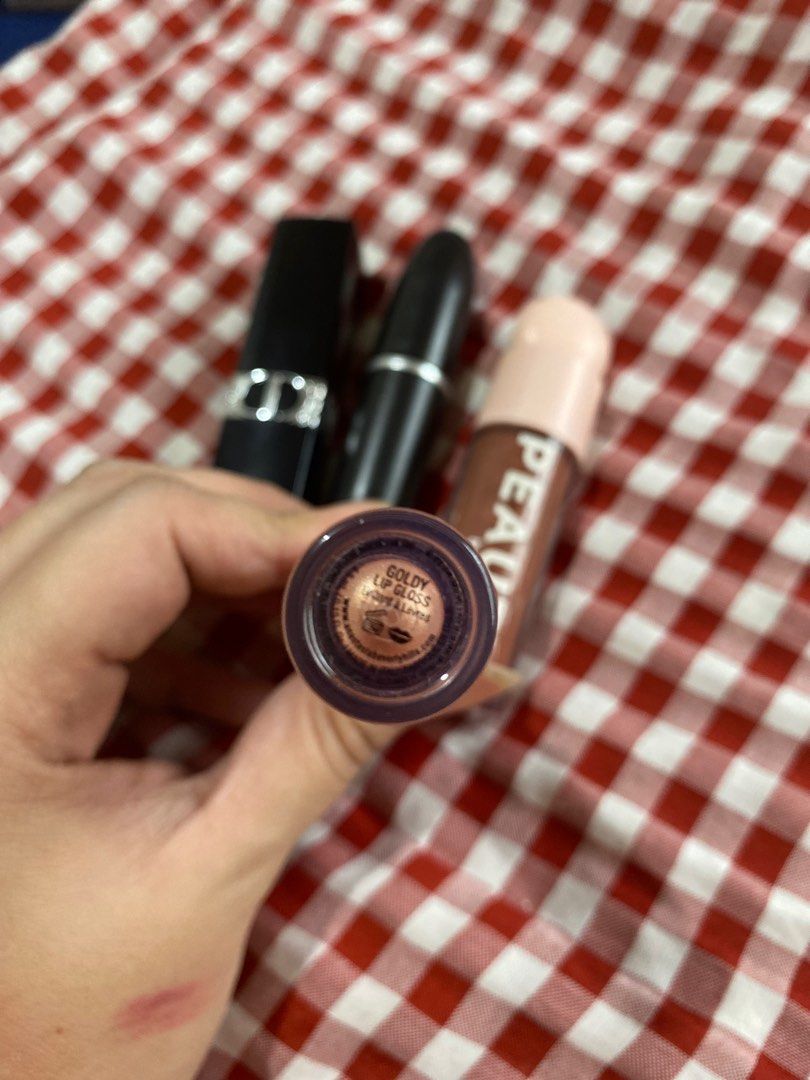 TAKE ALL LIPPIES AND BLUSH (Category: Makeup) located in Paranaque City. Submitted by msperegreen (Listing ID 1387040495, Image 3). Description: Take all lip bundle Dior 824 Abh gloss in goldy Artisan pro saint tropez (matte liquid lipstick) Mac peach blossom lip bullet Peauty blush in retouch All wearable shade!!! Swatched or used once only. Take all for 2k.