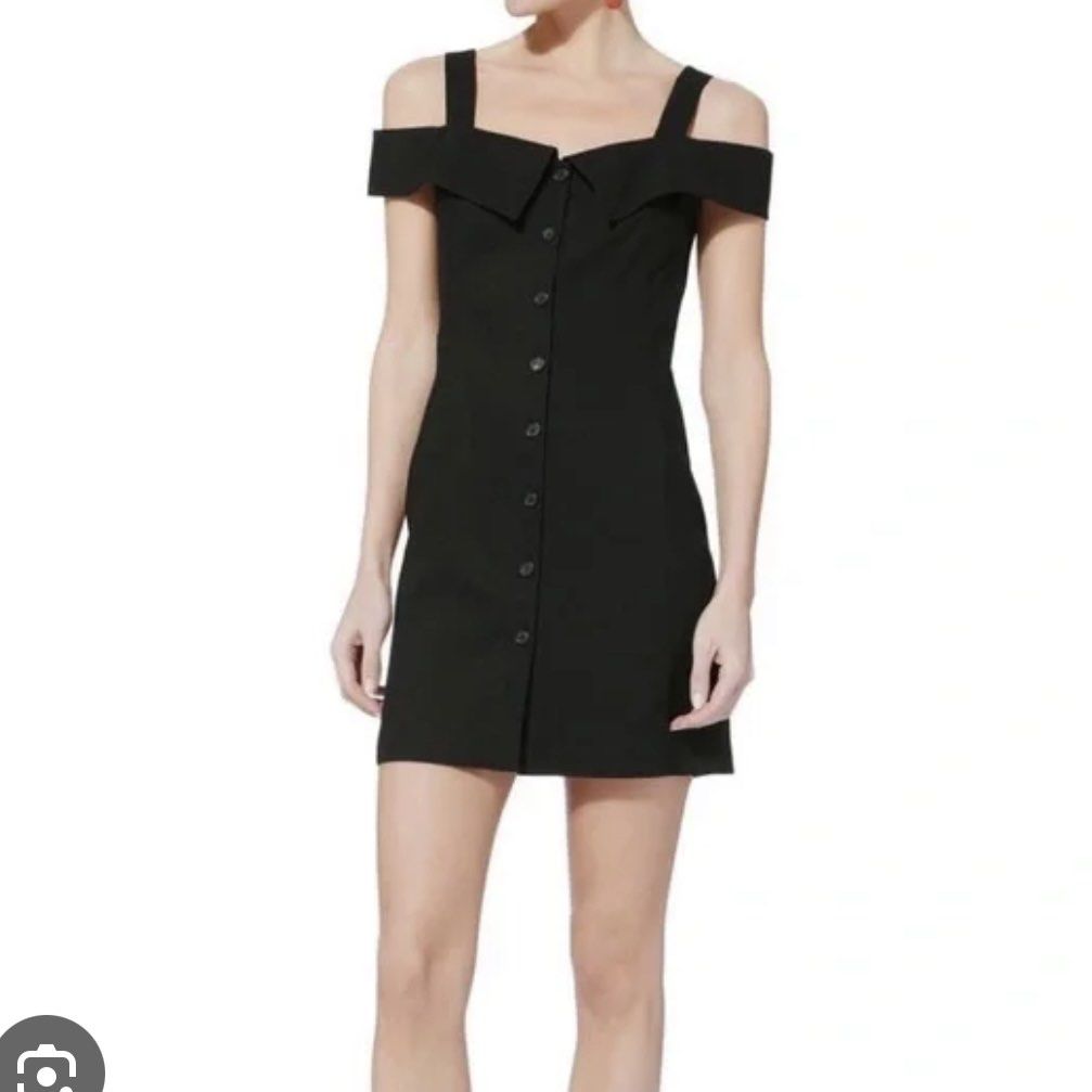 Black cold shoulder strappy dress (Category: Dresses) located in Santa Rosa. Submitted by ihdstyles (Listing ID 1387282319, Image 2). Description: Fits XS Not stretchy Second pic inspo only.