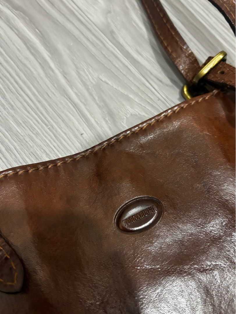 Brown Leather Shoulder Cross body bag (Category: Shoulder Bags) located in Manila. Submitted by prelovedbymfl (Listing ID 1387253367, Image 2). Description: Well made genuine leather bag Tournabuoni brand made in tuscany.