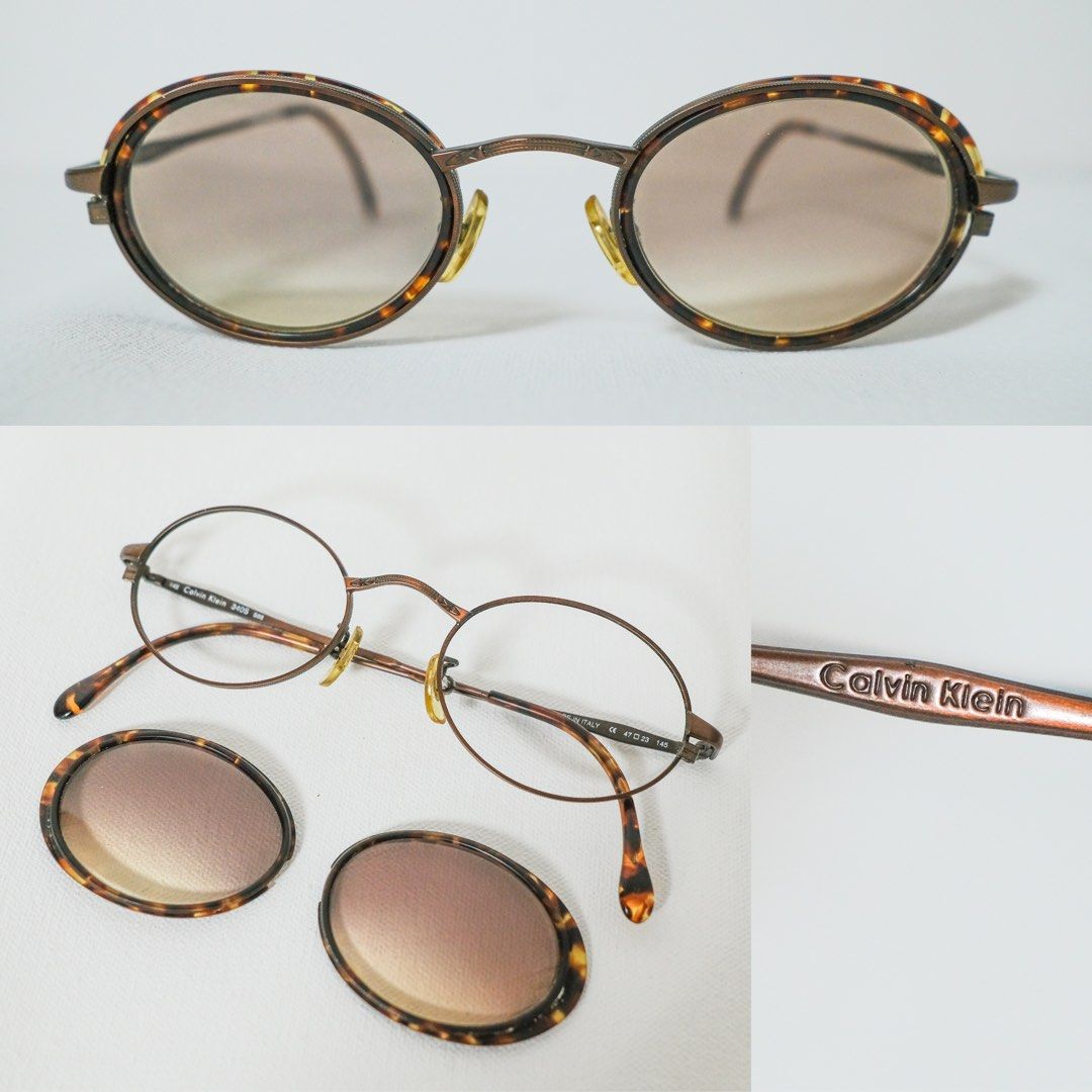CALVIN KLEIN Vintage Sunglass (Category: Sunglasses & Eyewear) located in Pasig City. Submitted by space.byp (Listing ID 1387172208, Image 1). Description: CALVIN KLEIN Vintage Sunglass. Authentic. Made in Italy. This pair of vintage Calvin Klein sunglasses showcases a unique and elegant design, blending classic craftsmanship with thoughtful utility. Round, full-rim silhouette. The temples and bridge are made of a slim metal in a bronze/copper to