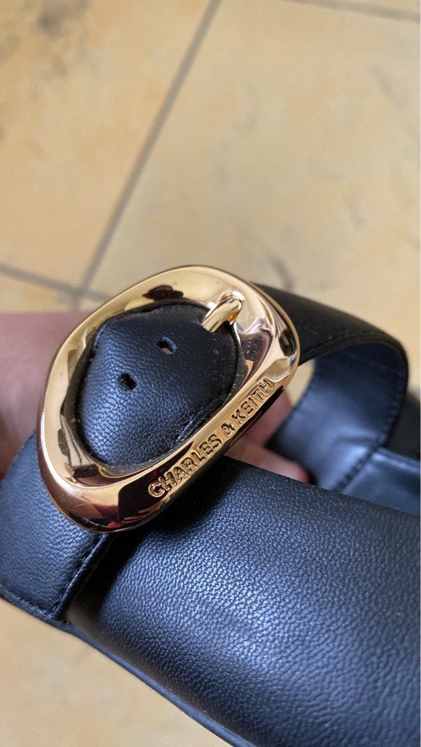 Charles & Keith - Black Buckle-Strap Flat Mules (Category: Flats & Sandals) located in Quezon City. Submitted by thssdrnn (Listing ID 1387167886, Image 2). Description: In perfectly good condition, barely worn. Good as new. Rfs: Decluttering..