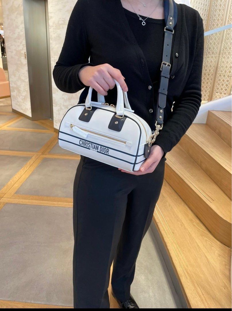 Christian Dior Vibe Zip Bowling Bag (Category: Luxury Bags & Wallets) located in Quezon City. Submitted by moniquesanchez (Listing ID 1387273218, Image 2). Description: Decluttering! Lowered the price :) Used literally once during trip in germany Large, Black color, 2nd photo is only size reference when being bought Store bought 120k Personally owned/1st owner More photos available upon request RFS: Size not suitable for me, decluterring .