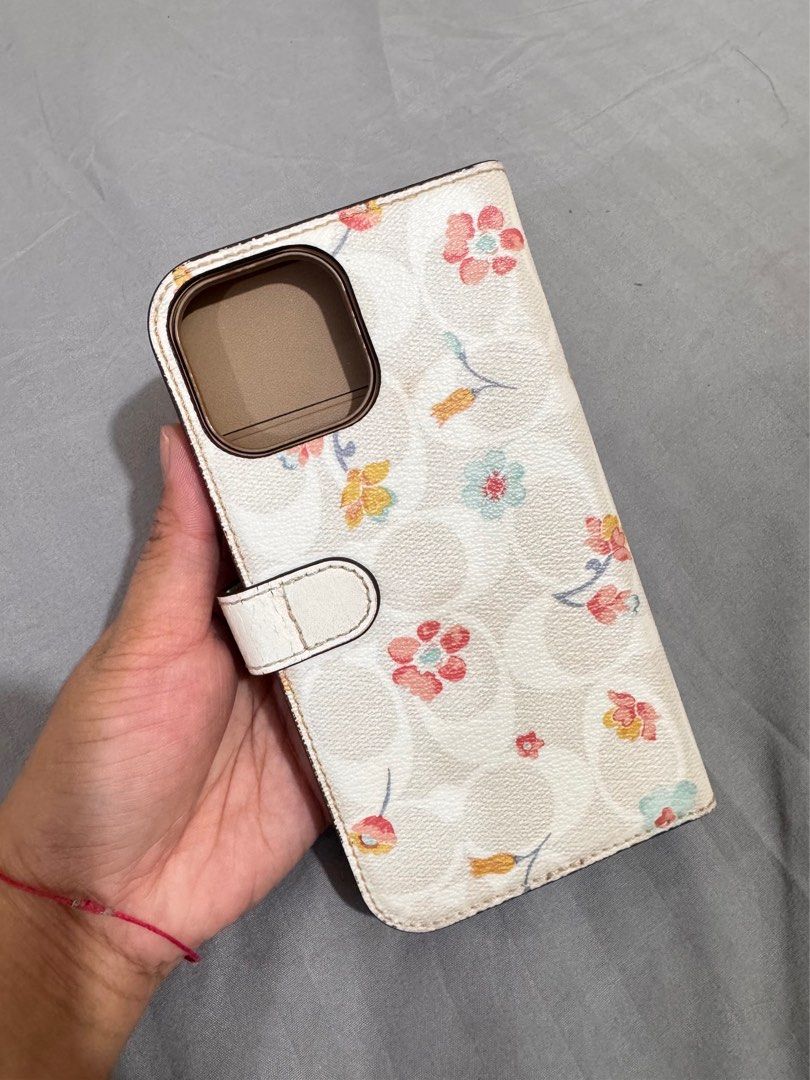Coach Iphone 12 promax (Category: Cases & Sleeves) located in Quezon City. Submitted by xtinef1022 (Listing ID 1387307281, Image 2). Description: Original Coach Phone Case with minimal flaws Marikina City.