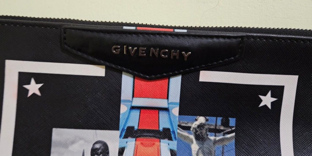 Givenchy Clutch bag (Category: Luxury Bags & Wallets) located in Bauko. Submitted by callwan24792 (Listing ID 1387181307, Image 2). Description: Elegant and timeless, this clutch bag is perfect for both day and evening use. Crafted with Givenchy’s signature sophistication, it features a sleek silhouette that easily complements any outfit. This piece shows signs of usage such as light wear on the material and edges, but remains in good overall con