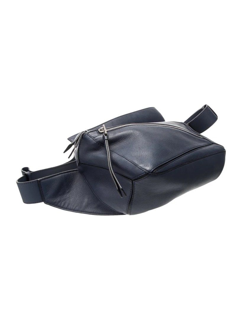 Loewe Small Puzzle Bumbag (Category: Luxury Bags & Wallets) located in Paranaque City. Submitted by marcobaltazar (Listing ID 1387347277, Image 3). Description: In good condition. With few hairline scratches on buckle. Comes with dustbag and cards.