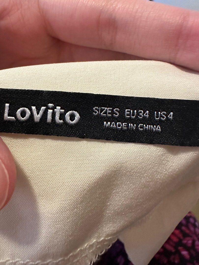 Lovito Buttoned Sleeveless Top (Category: Sleeveless) located in Makati City. Submitted by masterch3f (Listing ID 1387219786, Image 2). Description: - Used once - Cream/ White Color Size: S Shipping shouldered by buyer .
