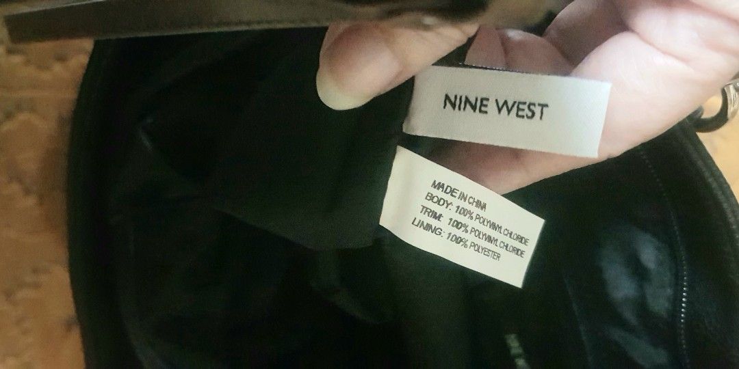 Nine West Black Tote Bag, leather-chain (Category: Tote Bags) located in Quezon City. Submitted by practibagsplusmnl (Listing ID 1387337026, Image 3). Description: Nine West Black Tote Bag, leather-chain; still with tags. Bought by aunt for $76, in the States, 2 years ago, gifted to me, never used it. Too many bags, so decluttering..