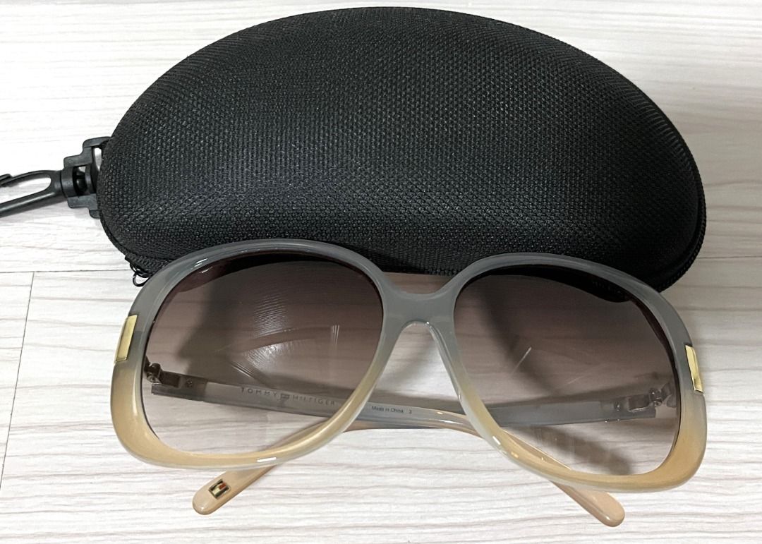 [Pre-Loved] Tommy Hilfiger Sunglasses (Category: Sunglasses & Eyewear) located in Pasig City. Submitted by findingviolet (Listing ID 1387239722, Image 2). Description: [Pre-Loved] Tommy Hilfiger Sunglasses Brand: Tommy Hilfiger Notes: No original casing but will provide black case (as shown in photo) Condition: Used with case - around 2x only RFS: Decluttering, realized the frame/design does not suit me Mode of Payment: GCash / Maya / BPI Bank Tr