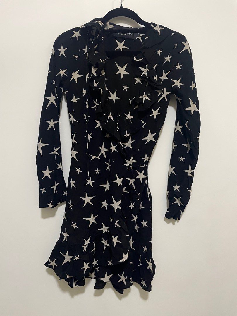 Réalisation Par “Alexandra” Dress - Star Print (Category: Dresses) located in Makati City. Submitted by jddeclutters (Listing ID 1387284886, Image 2). Description: AUTHENTIC. Réalisation Par. Used but in good condition. Slight print migration in the arm pits but unnoticeable when worn. Star print. Flowy! Super comfortable! SELLING FOR: ₱ 1,200 + shipping MATERIAL: 100% Silk crepe No low ball offers. This is already a STEAL. (SRP: $300 AUD) Tags: 