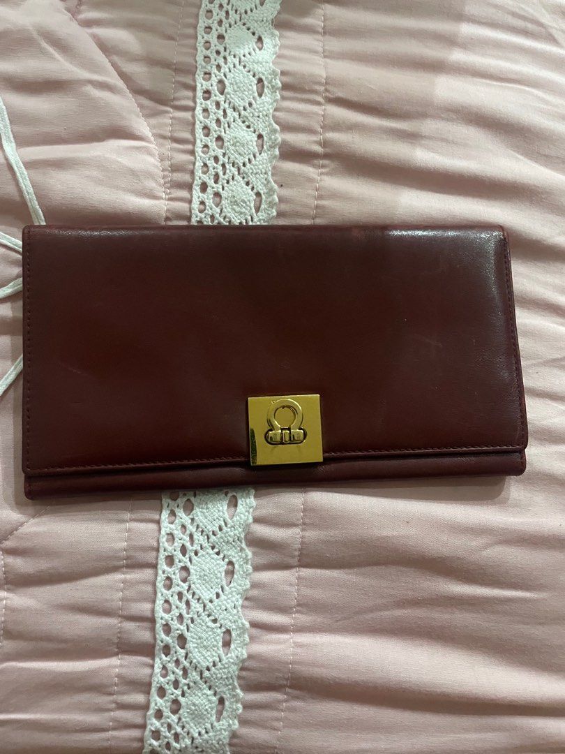 Red ferragamo leather wallet (Category: Luxury Bags & Wallets) located in Makati City. Submitted by sunshine0701 (Listing ID 1387316619, Image 1). Description: Minimal unnoticeble light scratches ( shown on pics).
