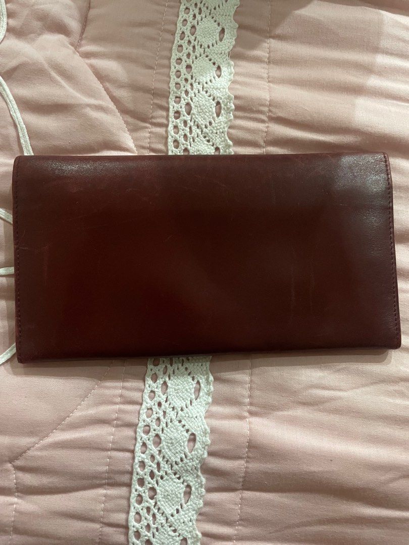 Red ferragamo leather wallet (Category: Luxury Bags & Wallets) located in Makati City. Submitted by sunshine0701 (Listing ID 1387316619, Image 3). Description: Minimal unnoticeble light scratches ( shown on pics).