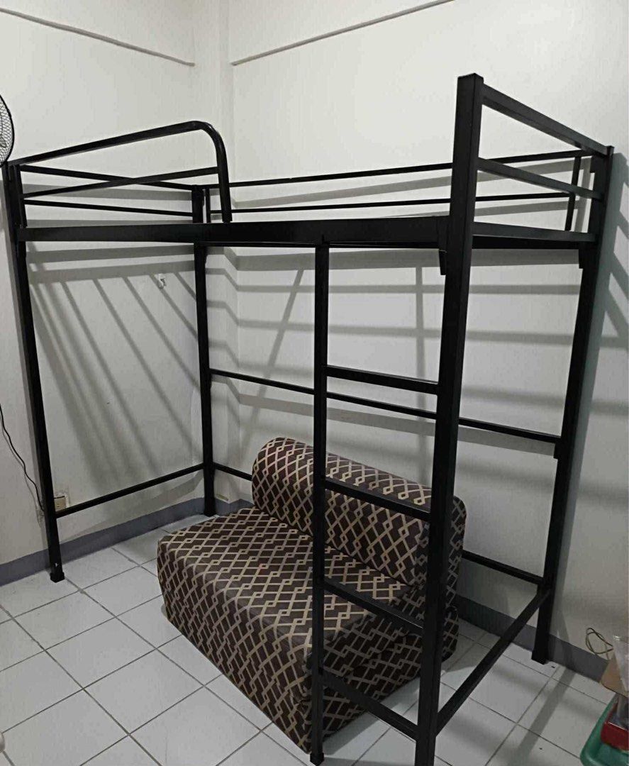 Semi Double Loft Bed Frame (Category: Bed Frames & Mattresses) located in Manila. Submitted by yulin_ara (Listing ID 1387295369, Image 1). Description: less than a year lang nagamit perfect for space saving can comfortably fit 2 people bought for 12.5k selling for 7.5k (fixed) metal bed frame 48x75 inches only issue ay yung tuklap na pintura (see picture) other than that still good and sturdy.
